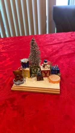 Christmas table decor with Christmas tree snowman toy, teddy bear candy cane