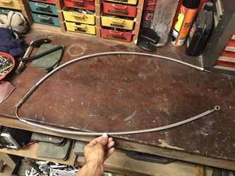 Motorcycle gas cap and clutch cable