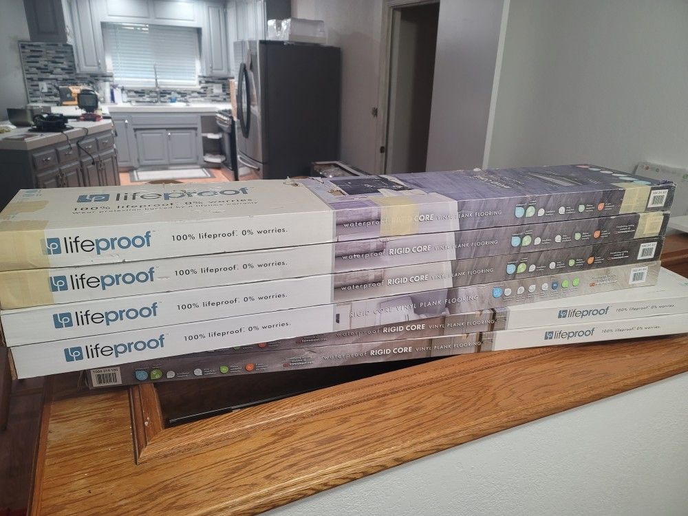 Brand New Lifeproof Vinyl Flooring 9 Boxes. 3 Colors Of Each
