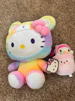 Large hello kitty plush and 3 more stuffies
