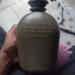  U.S. Military Issue 1-quart plastic canteen. 