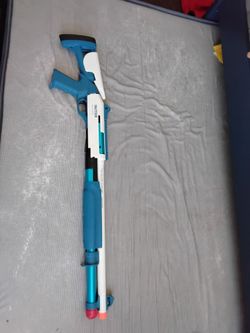 Dart ejecting shotgun toy