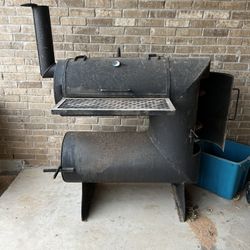 Fire tube smoker