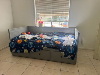Twin bed with storage drawers and mattress