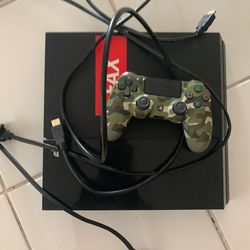 PlayStation 4 (PS4) + Controller + Cables – Great Condition