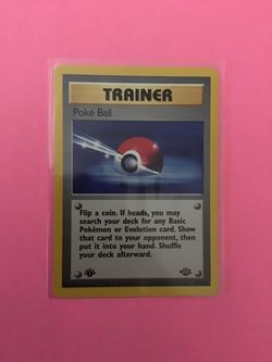 1st edition Poke Ball 64/64 Pokemon Trainer Card from Jungle