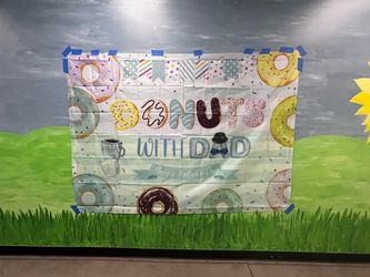 Donuts with Dad banner