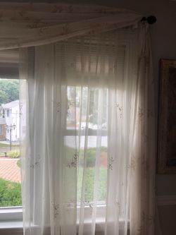 Five 84 inch curtains and a 144 inch rod