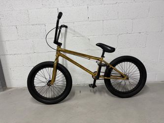 Elite BMX Destro - Gold, a 20-inch freestyle BMX