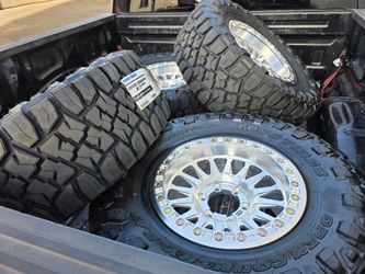 17" KMC KM445 BEADLOCKS w- 33" Toyo RT Pro