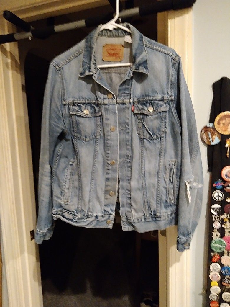 LEVI JACKET. SZ. XLG MENS ELBOWS CUSTOM CUT BACK HAS HAND PRINTED MESSAGE. 100 DOLLARS
