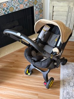 Doona car seat stroller beige with TWO car bases