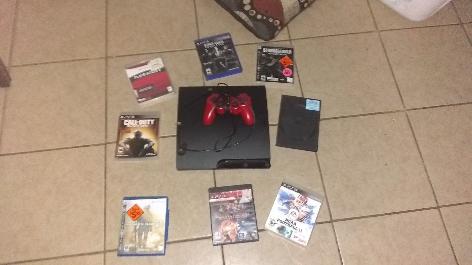 PS3 with 9 games and red wired controller