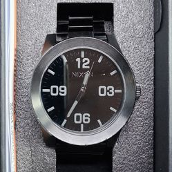 MEN'S NIXON THE CORPORAL STAINLESS STEEL WATCH & MEN'S BLACK & BLUE TUNGSTEN CARBIDE RING