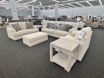 Silver grey sofa, loveseat, and chair