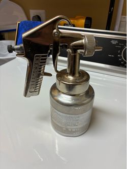 Craftsman branded siphon-feed paint spray gun.