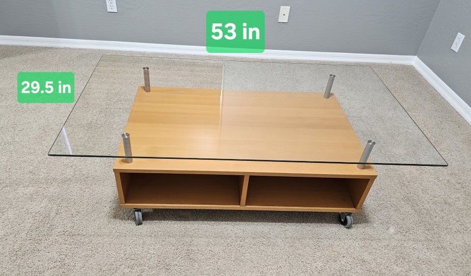 Coffee Table with Tempered Glass and Wheels – In Excellent Condition!