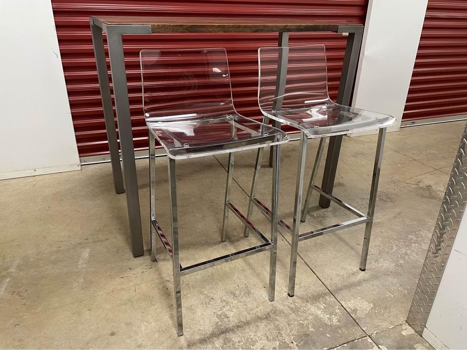 Stilt 42" High Dining Table and Set of Clear Stools