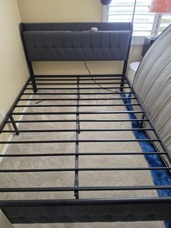 Metal Bed Frame with a built-in charging station and Upholstered Headboard