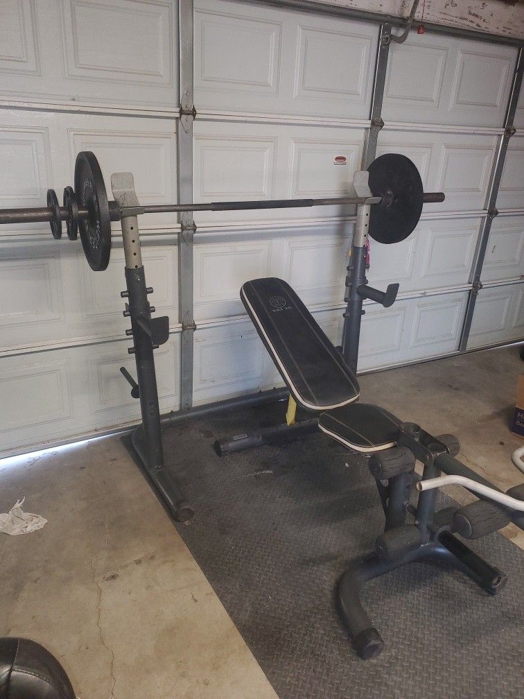Olympic Weight Bench With Squat Rack Leg Developer curl bar & Olympic Weight set 140lbs read Description