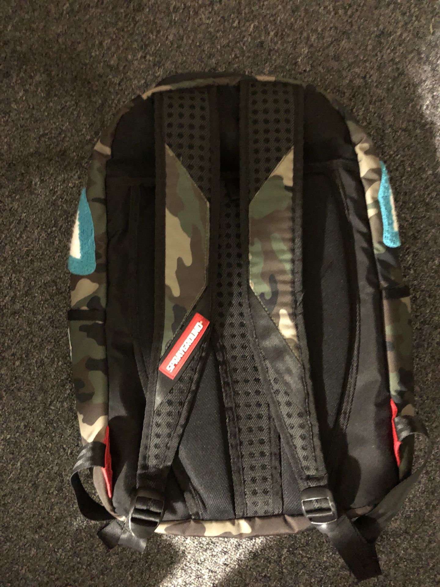 fake sprayground backpack