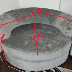 For Sale/ GREY ROUND LIVING ROOM CHAIR THAT SWIVELS
