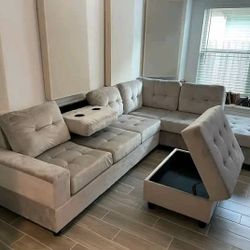 I'm selling a sectional with an ottoman. Ask for the price. 