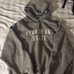 Fear of God Essentials light green hoodie