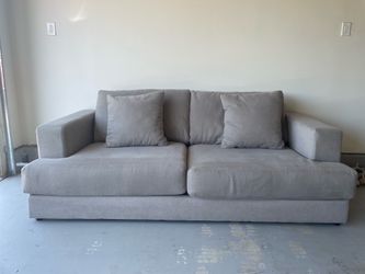Mor beige sofa with pillows