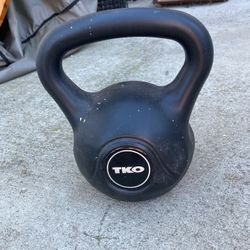 FREE.      Solid 15 pound lifting weight