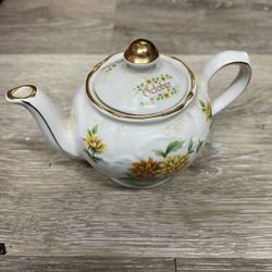 Miniature, ceramic teapot, October, approximately 4 inches