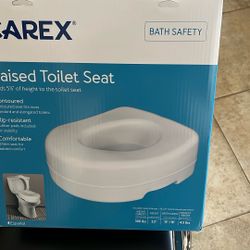 Carey raise toilet seat