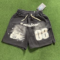 HELLSTAR black shorts with white graphic design