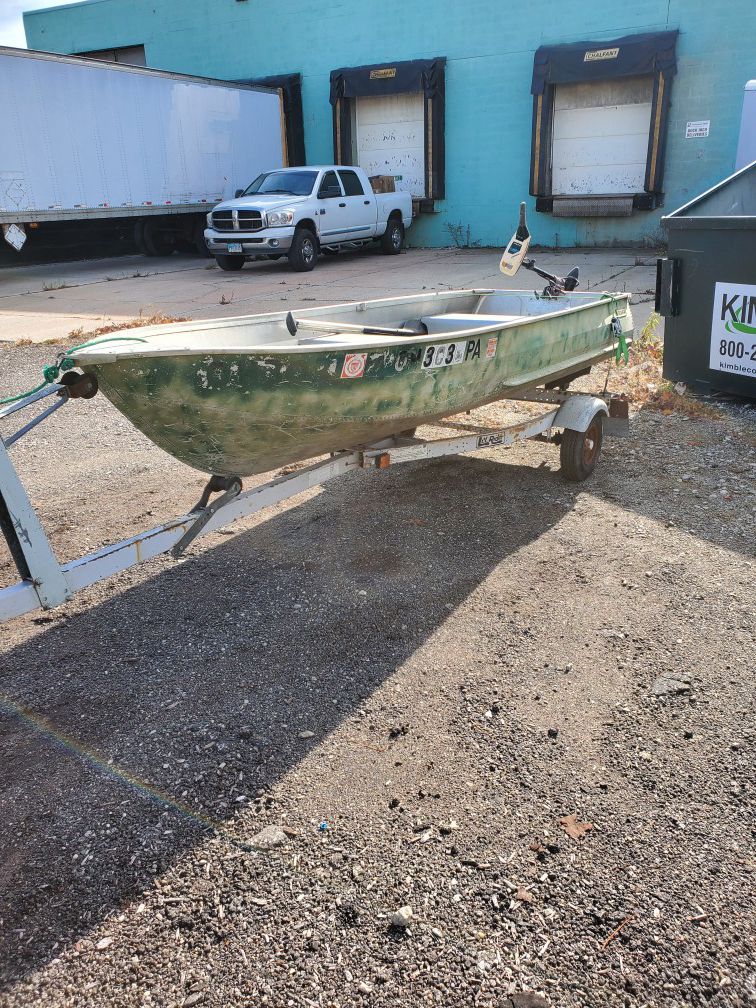 Boat, 12 foot with trailer.