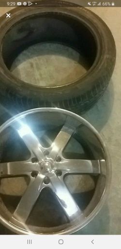 One 22 inch rim and tire make a offer