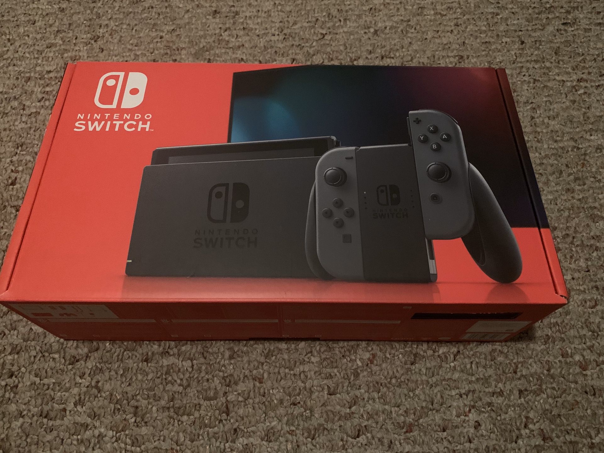Brand New Nintendo Switch with Gray Joy-Con