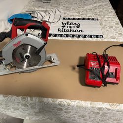 Milwaukee Wireless Saw and Charger 