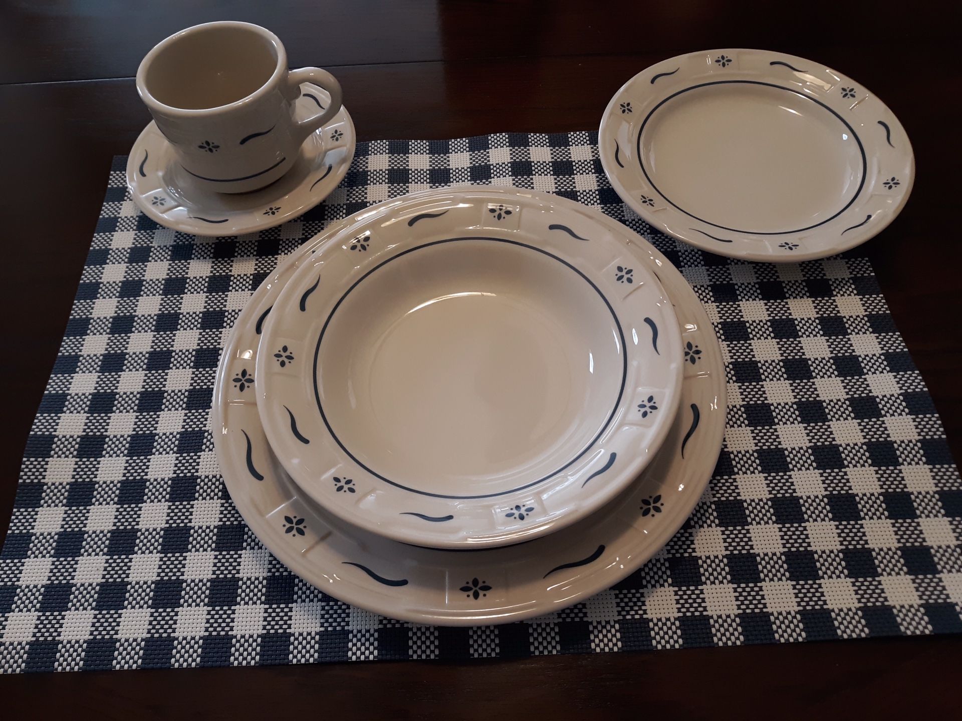 Longaberger pottery dishes. 8 place complete place settings plus much more