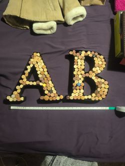 Metal A & B wine cork holders