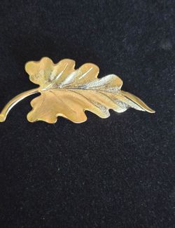 Vintage Monet gold tone leaf brooch, 2"