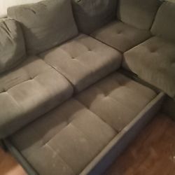 Sectional Opens To A Bed With Ottoman