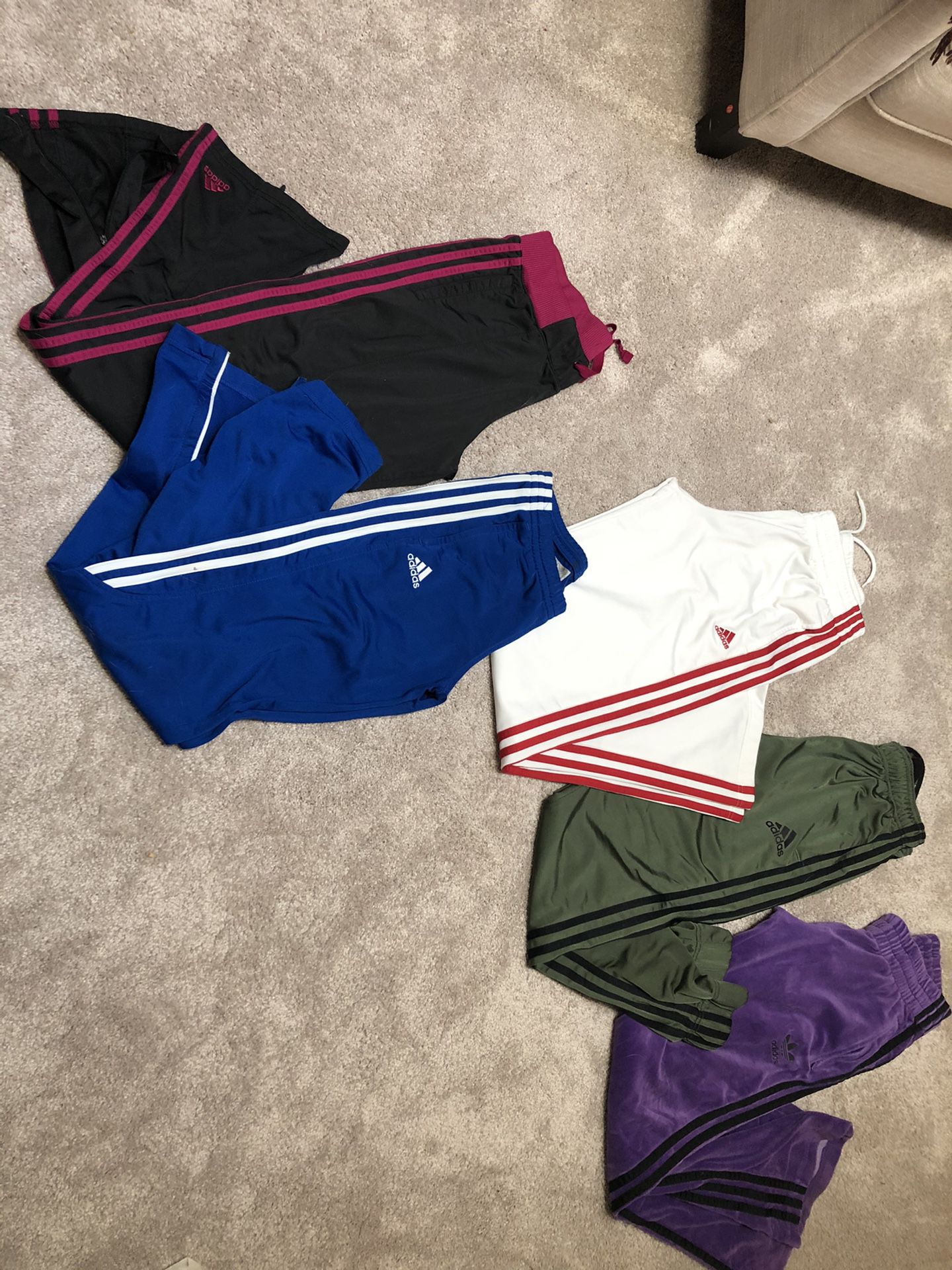 Women’s assorted Adidas and Under Armour track pants Sizes: XS-MD