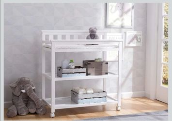 Delta Children Flat Top Changing Table with Wheels and Changing Pad - Greenguard Gold Certified, Bianca White