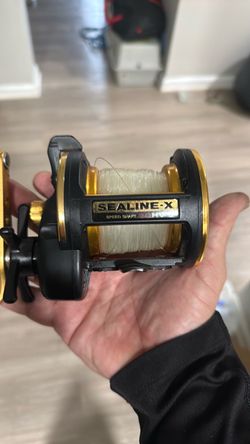 2 Deep sea rods & reels and 2 freshwater rods