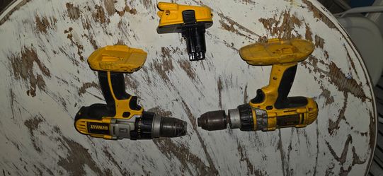 Two 18v Dewalt cordless drills with 20v adapter