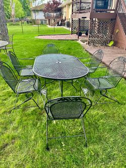Large vintage patio set, table with 6 bouncy spring chairs, freshly painted, Delivery Available