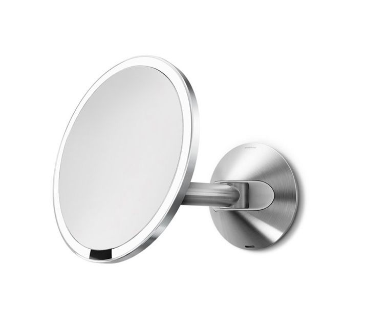 Simple human sensor mirror. 8” wall Mount. New open box. 5x magnify. Brushed finish. Tri-lux: stimulates natural light. MSRP: $230. Our price: $140 + 
