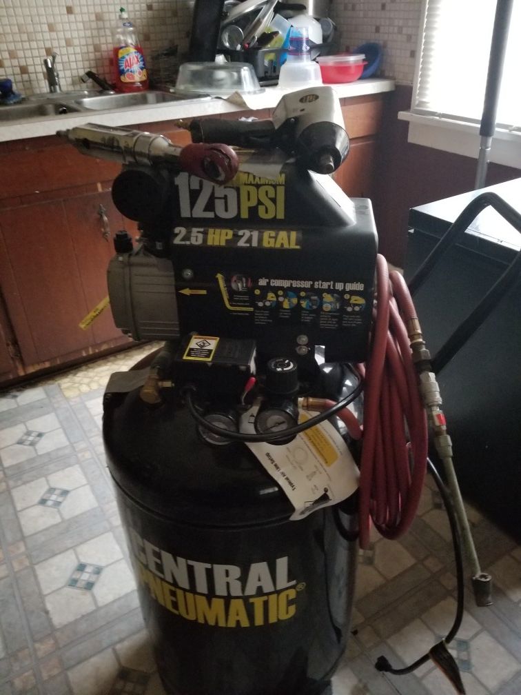 Air compressor with hose and tools