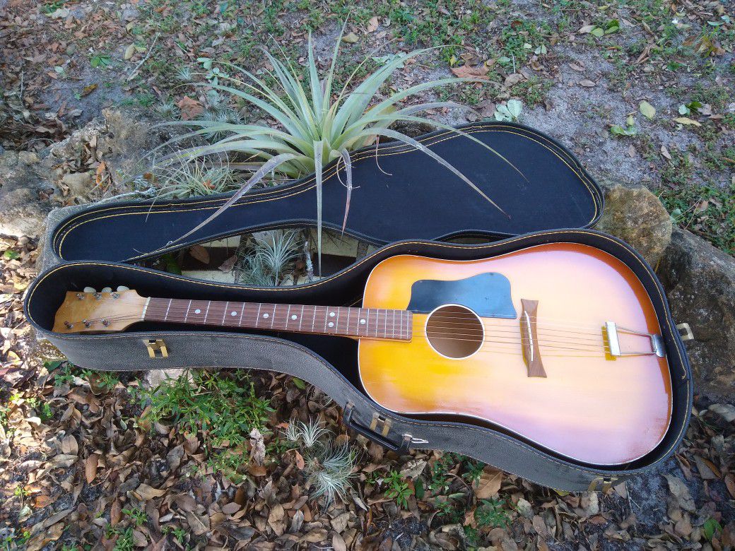 Vintage acoustic guitar.
Guitar Center just put strings on it.
