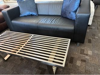 Premium leather sofa with contemporary coffee table!